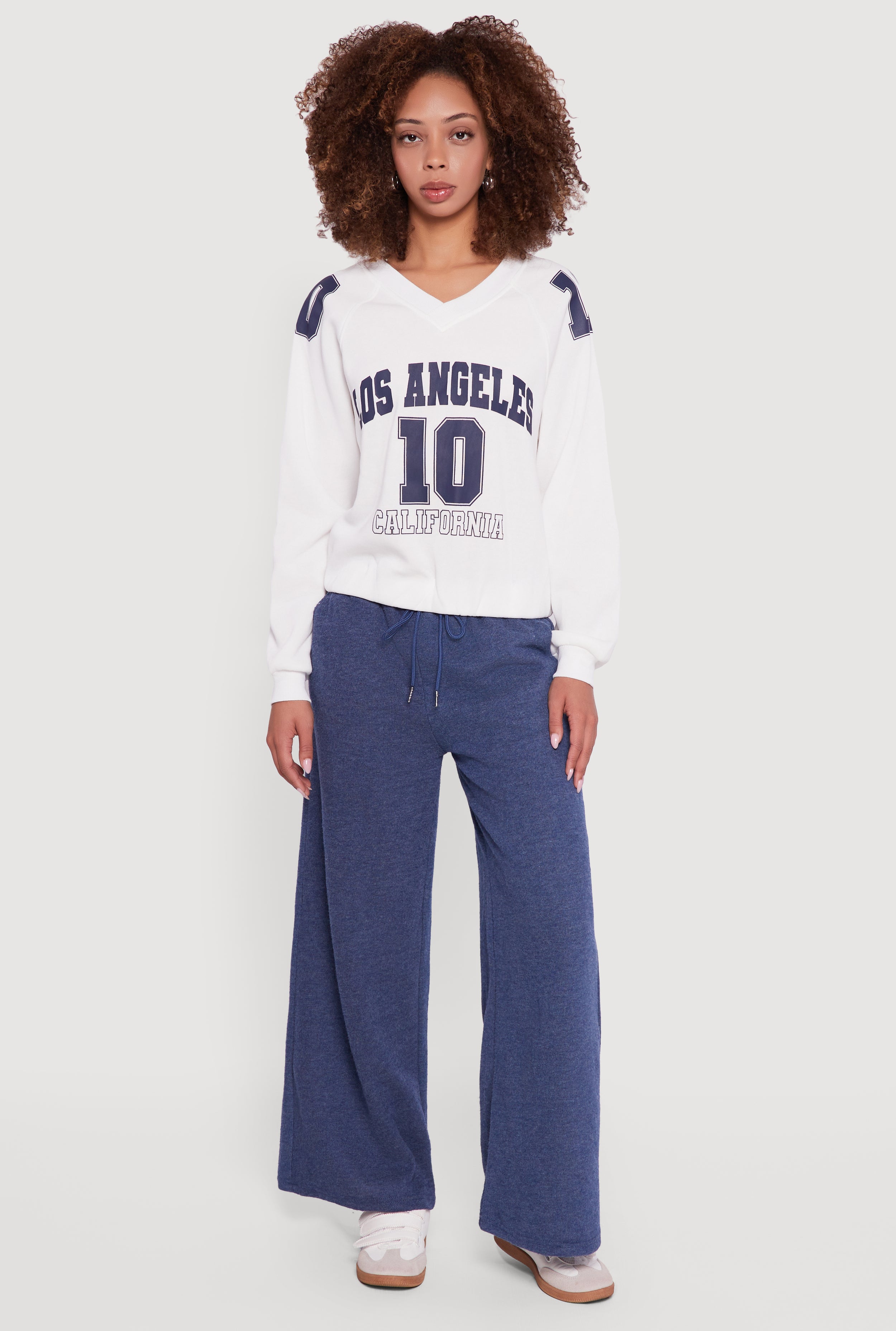 Almost Famous Elastic Hem Cropped Graphic Sweatshirt
